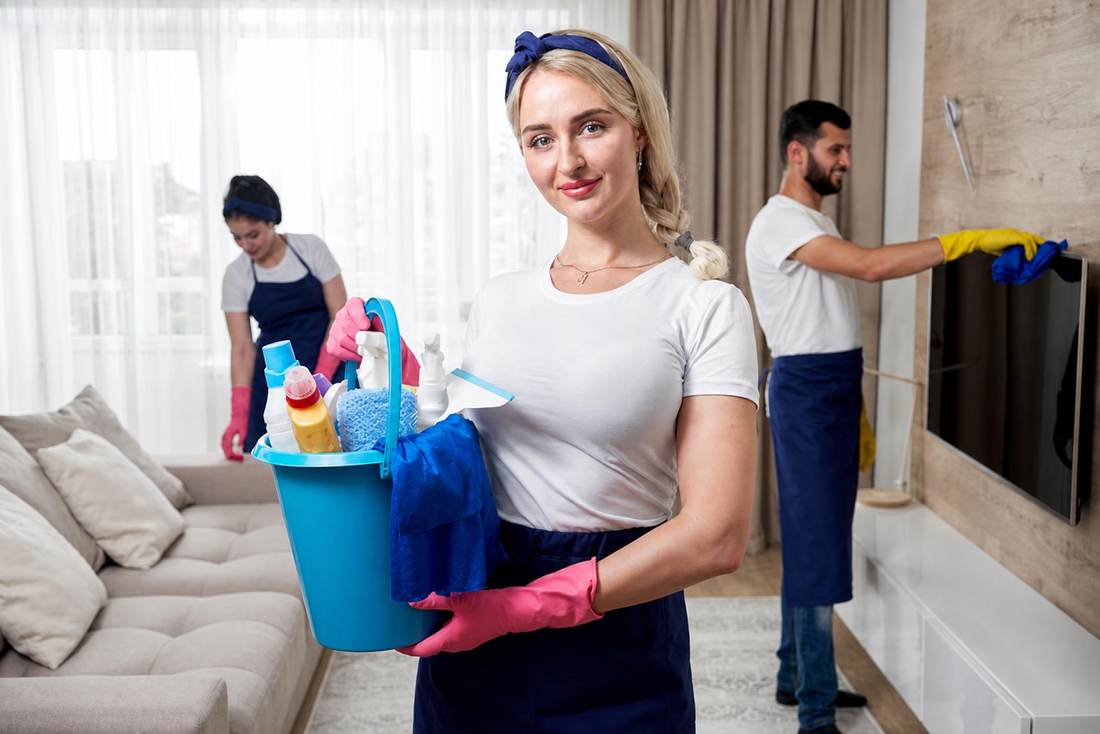 The Heron Cleaning team at work in a client's living room
